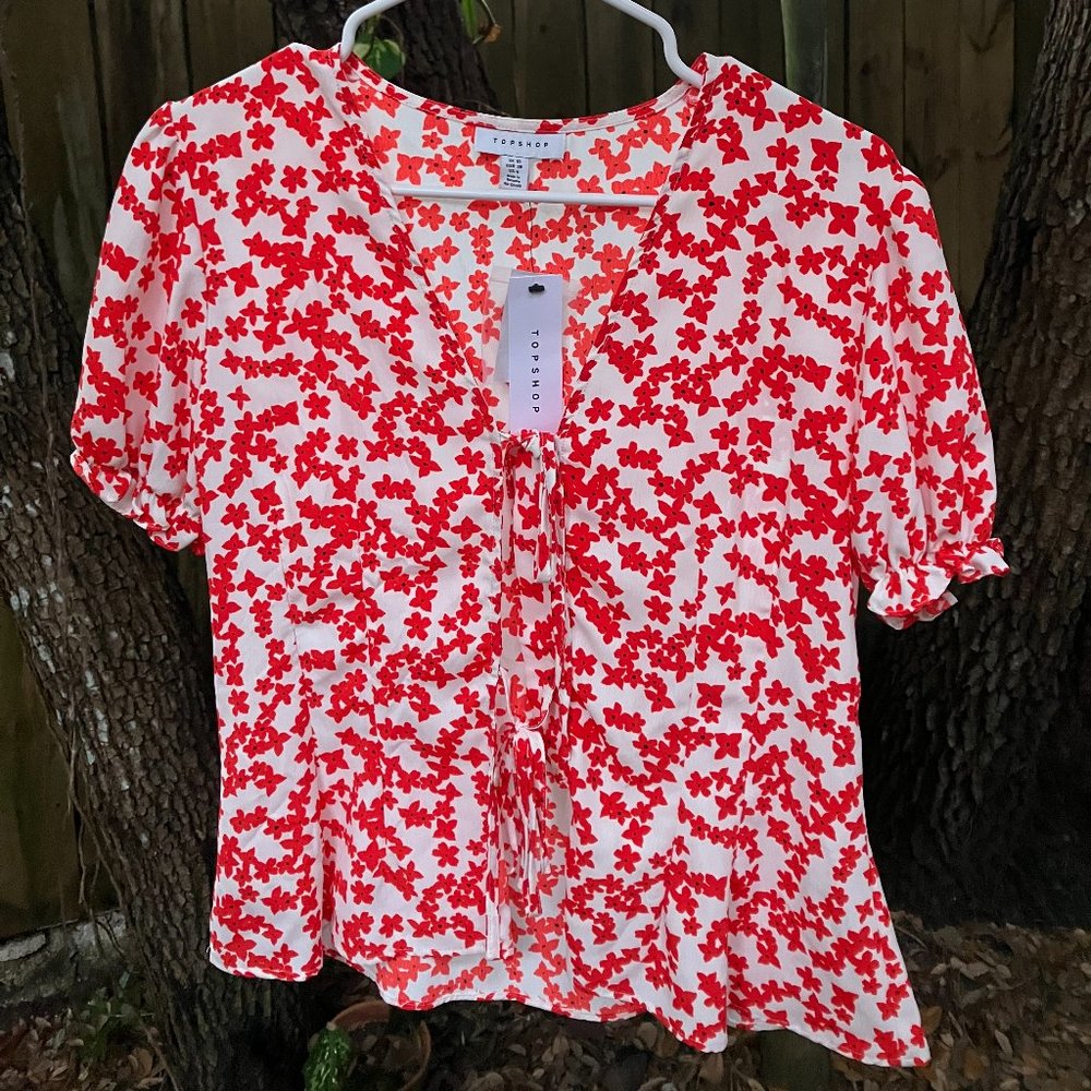 TOPSHOP tie front floral blouse.